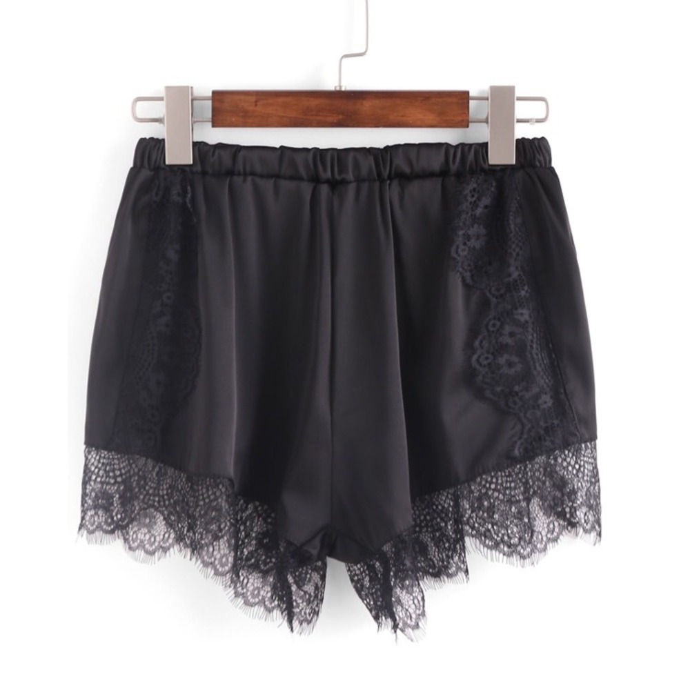 Romwe black lace trimmed dolphin shorts